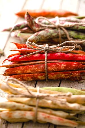 Healthy vegetarian food. Collection of beans. Freshly harvested beans variety. Beans on tableの写真素材