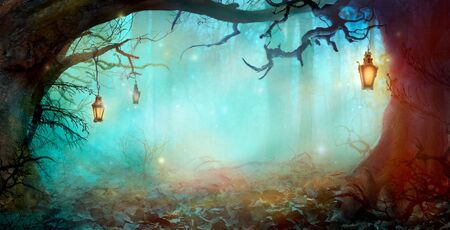 Halloween Background with Lanterns in Dark Forest in Spooky Night. Halloween Design in Magical Forestの写真素材