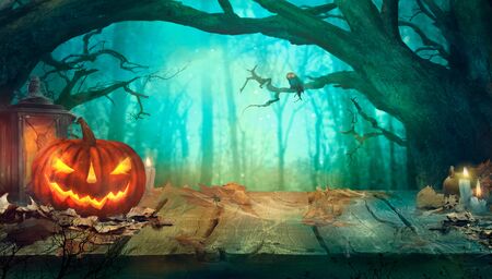 Halloween with Pumpkins and Dark Forest. Scary Jack O' Lantern Halloween Design on Tableの写真素材