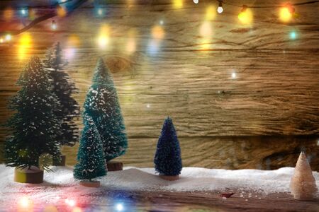 Christmas background with mini trees. Christmas festive backdropの写真素材