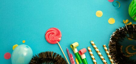 Birthday concept with gift box and confetti. Birthday baloons and candlesの写真素材