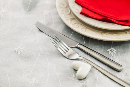 Valentines day table. Plate with  hearts. Valentine's day dinner.St. Valentine table settingの写真素材