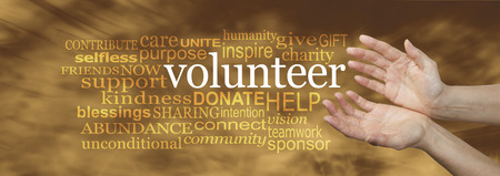 Volunteer Request Word Cloud -  wide banner with a woman's hands in an open needy position with the word VOLUNTEER surrounded by a relevant word cloud on a soft golden flowing backgroundの写真素材