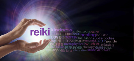Reiki Vortex Healing Word Cloud - Female hands cupped around the word REIKI with a relevant word cloud on a spiraling bright light vortex background and copy spaceの写真素材