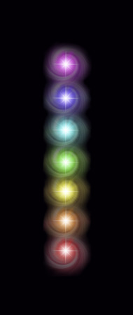 Just a single column of the Seven Spinning Major Chakras - magenta, indigo, blue, green, yellow, orange and red spiraling vortexes of energy in a neat vertical row on a rich black backgroundの写真素材