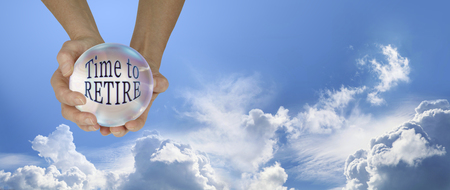 Looks like it is time to retire - Female hands holding a large crystal ball containing the words...