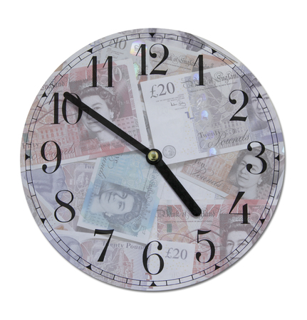 Time IS money Clock - a clock face showing 4.51 with a background surface of scattered random...