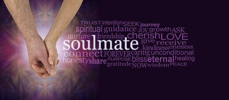 Soulmates Hand in Hand Word Cloud - mature male and female  hands holding with the word SOULMATE surrounded by a relevant word cloud on a pink and purple backgroundの写真素材