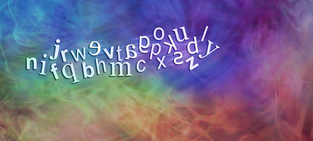 Chaotic Dyslexic Alphabet with reversed letters - wide rainbow coloured banner with a jumbled...