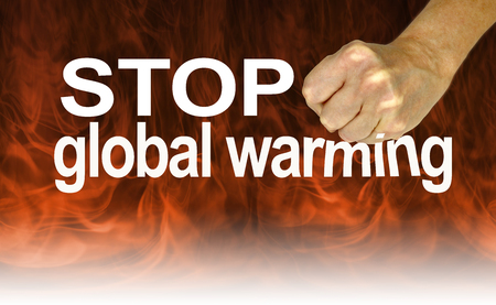 Listen to the Experts and Stop Global Warming - fist coming down on the word WARMING against a background of dark flames fading to whiteの写真素材