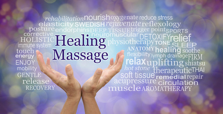 Healing Massage Word Cloud - female hands reaching up to the words HEALING MASSAGE surrounded by a relevant word cloud against a purple and gold bokeh backgroundの写真素材