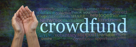 Crowdfunding concept tag word cloud banner - cupped female hands  beside a CROWDFUND word cloud against a rustic dark green  grunge backgroundの写真素材
