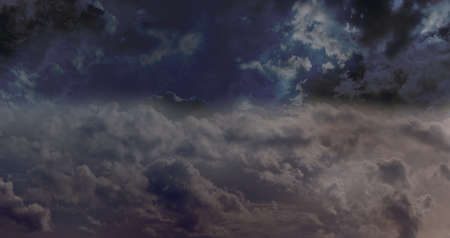 Dark night and cloudscape background - dark blue night sky with various cloud formationsの写真素材