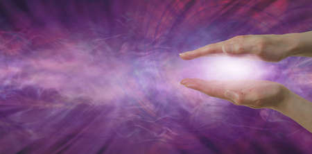 Reiki Magenta Healing Message Banner Background  - Healer with parallel hands and pink light between...