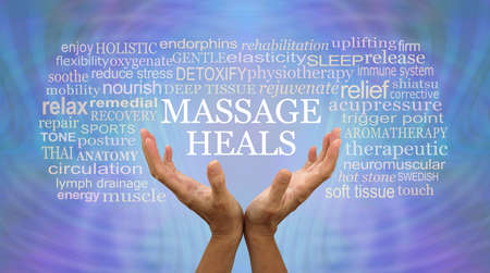 Massage heals blue word tag cloud - female hands reaching up with the words MASSAGE HEALS floating above surrounded by a relevant word cloud on a lilac blue matrix energy formation backgroundの写真素材