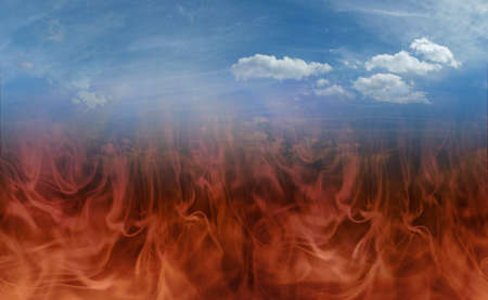 Scorched Earth Environment warning message background -  concept of earth on fire with blue sky and cloudsの写真素材