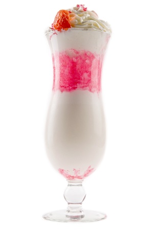 A delicious milk shake with chunks of fresh strawberries and whipped creamの写真素材