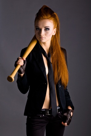 Beautiful redhead girl posing in studioの写真素材