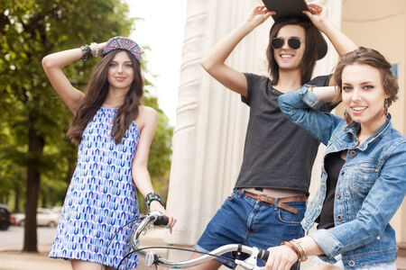 a group of young people smile for the cameraの写真素材