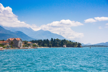 A small European city near the sea and mountains. Beautiful view of Tivat town, Montenegro.の写真素材