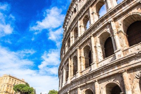 Colosseum in Rome against blue sky. Rome architecture and landmark. Italy.の写真素材
