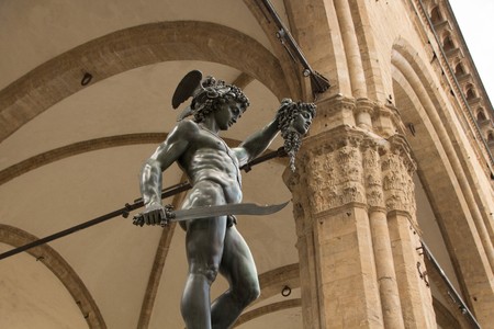 Perseus holding head of Medusa, bronze statue created by sculptor Benvenuto Cellini in the period 1545-1554. Loggia de Lanzi, Piazza della Signoria, Florence, Italy.のeditorial素材