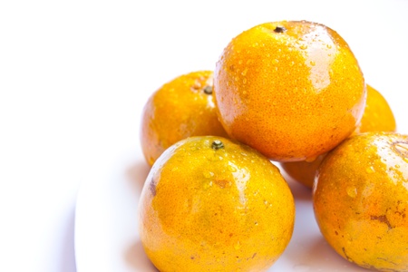 Orange In White plateの写真素材