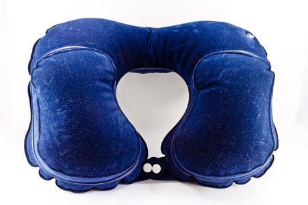 an inflatable travel cervical pillow isolated on a white background の写真素材