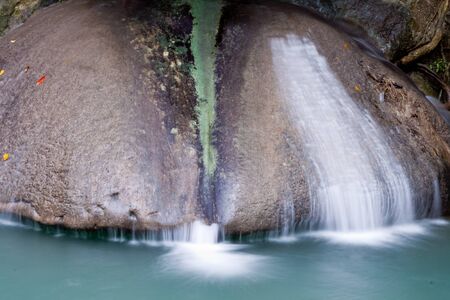 Deep forest Waterfall in Kanchanaburi, Thailandの写真素材