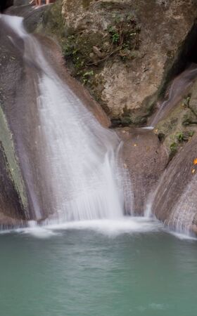 Deep forest Waterfall in Kanchanaburi, Thailandの写真素材