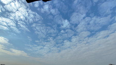 Blue sky with white clouds. Sky background. Blue sky with white clouds.の写真素材