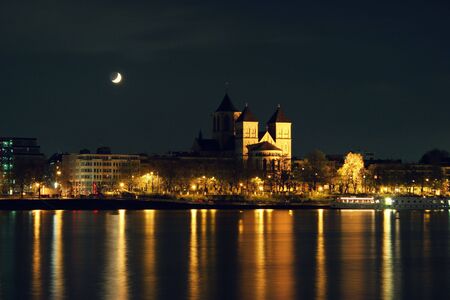 Church at night by the riversideの写真素材