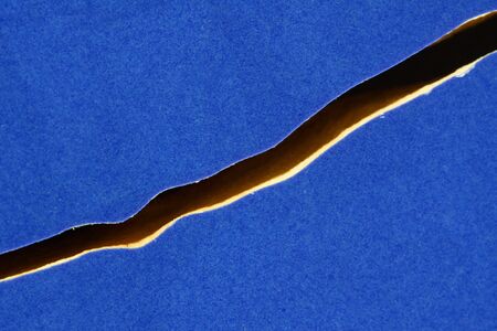 crack on blue surfaceの写真素材
