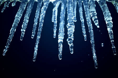 icicles at nightの写真素材