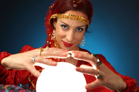 fortune-teller with a shining crystal ballの写真素材