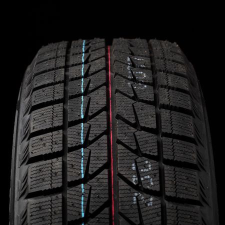part of winter tyres on black