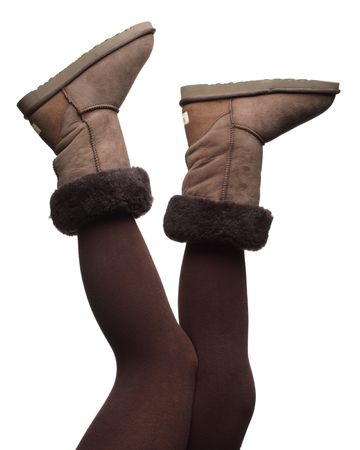 winter boots in the air, isolated