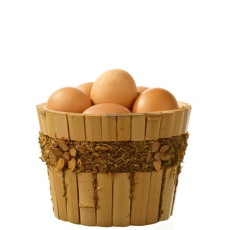 eggs in the wooden bucketの写真素材