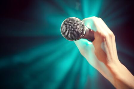 hand holding a mikeの写真素材