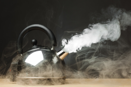 boiling kettle with dense steamの写真素材 [40007217450] - イメージマート