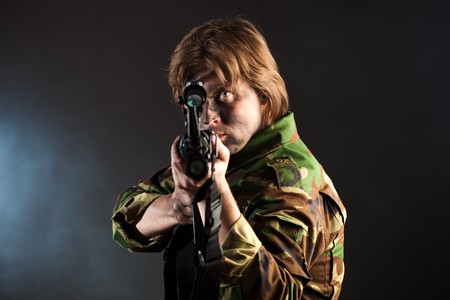 soldier aiming a weaponの写真素材