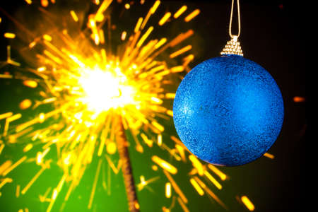 Christmas decoration on sparklers backgroundの写真素材