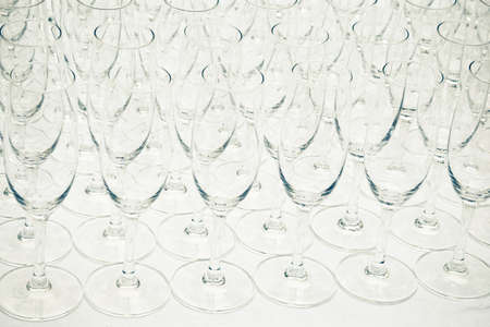 Multitude of empty champagne glasses or flutesの写真素材