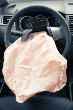 Airbag explodes on steering wheelの写真素材