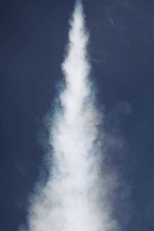 white dense smoke trailの写真素材