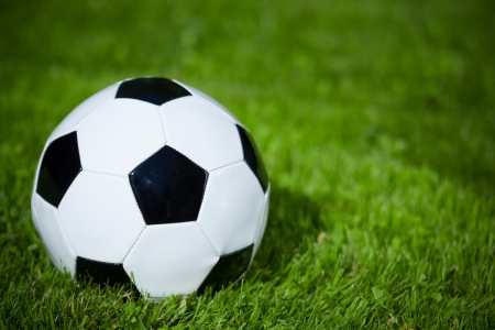 soccer ball on the grassの写真素材