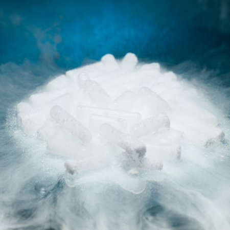 dry ice with vapor on blue backgroundの写真素材