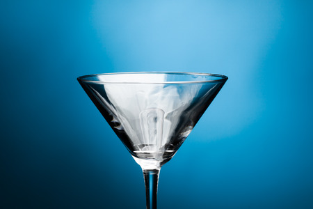martini glass on blue backgroundの写真素材