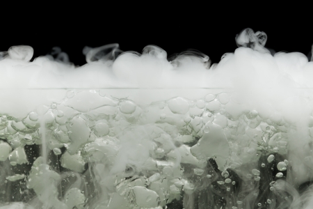 boiling dry ice with vapor, closeup viewの写真素材
