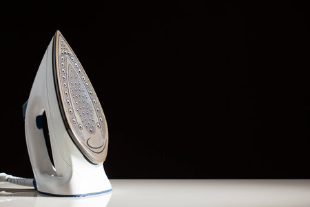 iron on black backgroundの写真素材